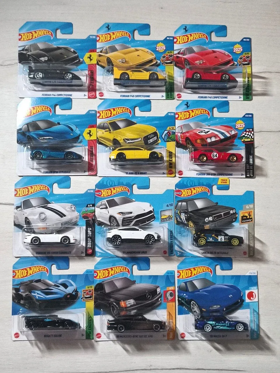 Колекційні машинки Hot Wheels та Matchbox (Ferrari, Porsche, Bugatti)