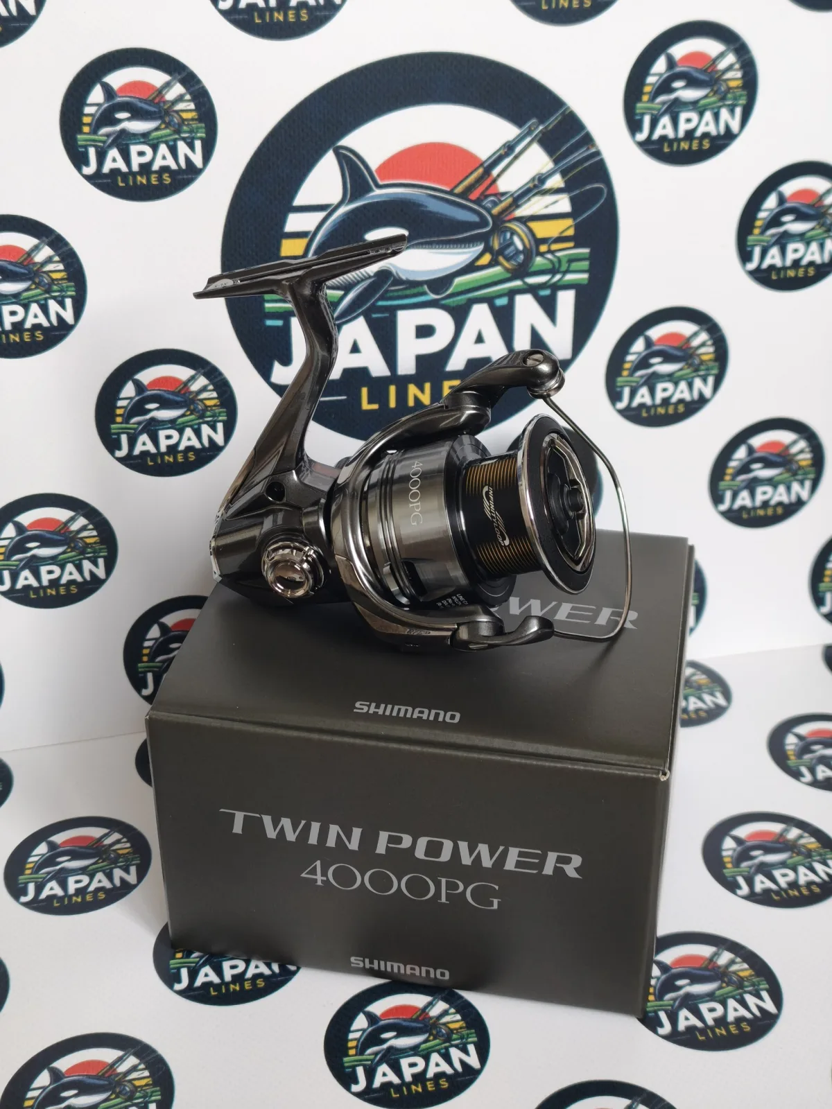 Рибальські котушки Shimano Twin Power 24 та Daiwa Luvias PC