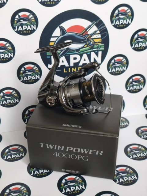 Рибальські котушки Shimano Twin Power 24 та Daiwa Luvias PC