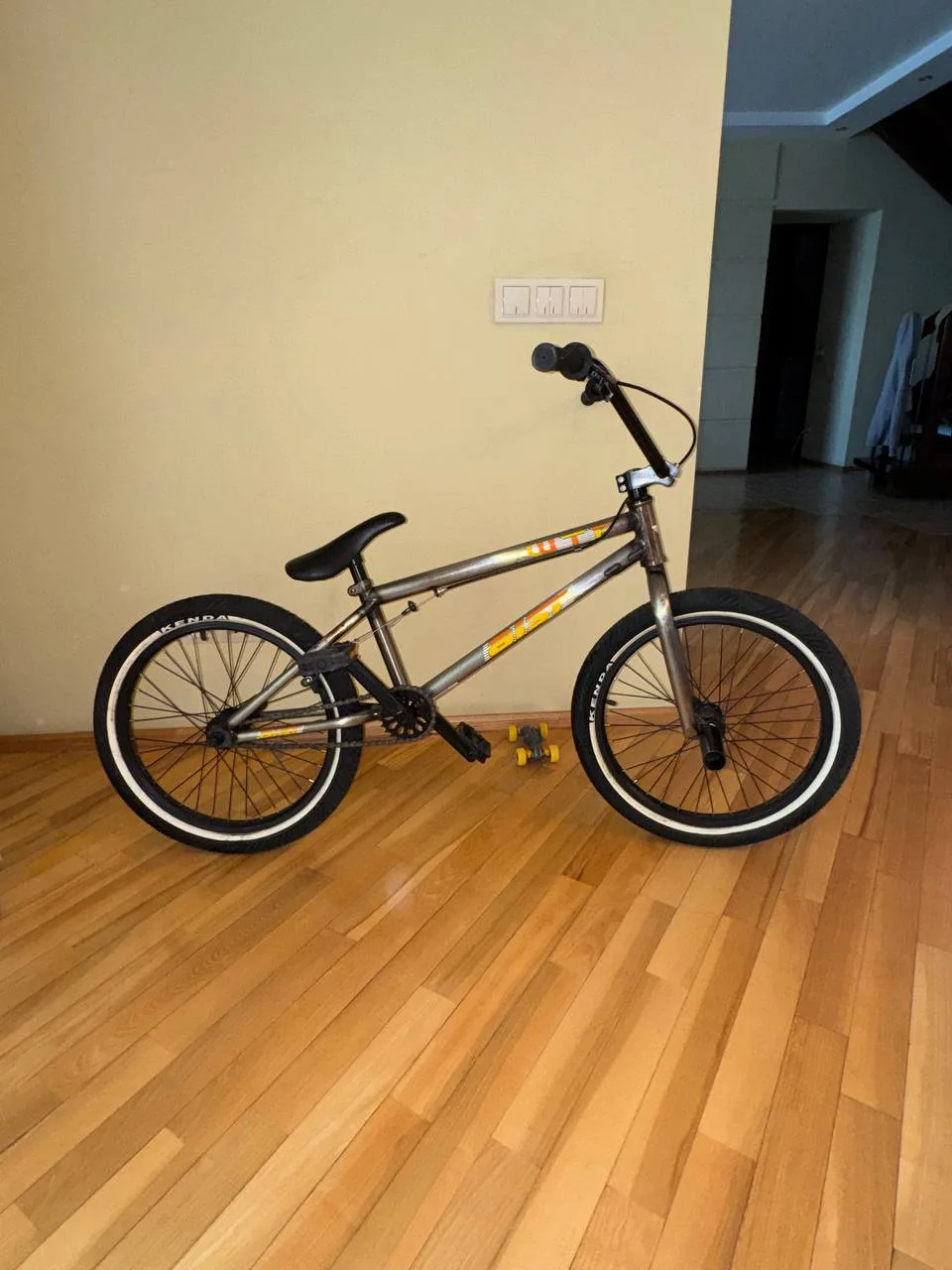 BMX велосипед хромований з помаранчевими акцентами