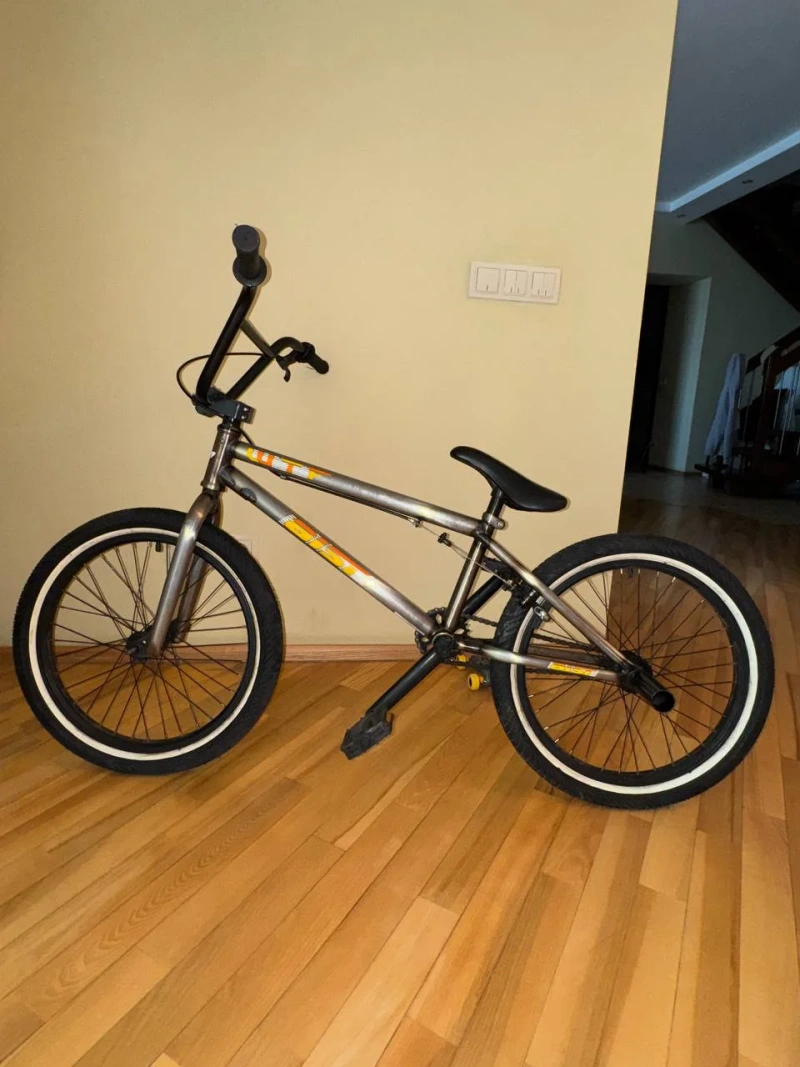 BMX велосипед хромований з помаранчевими акцентами — фото 3