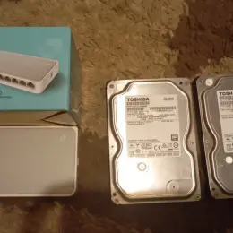 Сетевой коммутатор TP-Link TL-SF1008D и 2x HDD Toshiba 500 ГБ