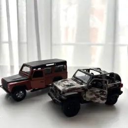 Коллекционные металлические машинки Jeep Wrangler и Land Rover Defender