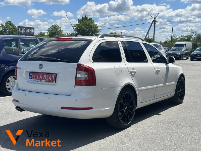 Skoda Octavia 2010 Белый — фото 2