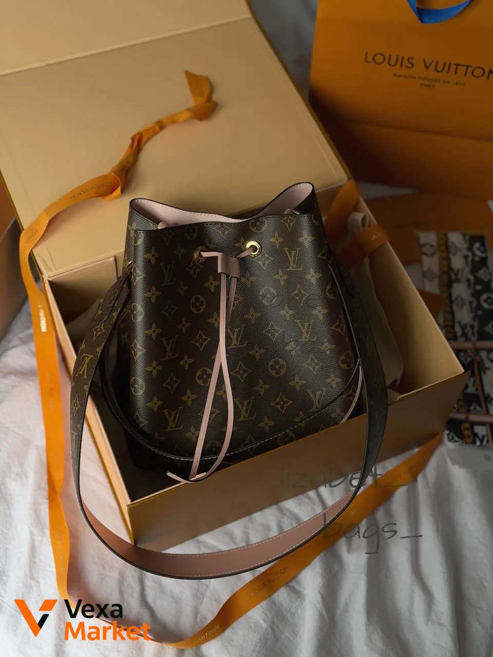 Louis Vuitton сумка-відро з натуральної шкіри та канви