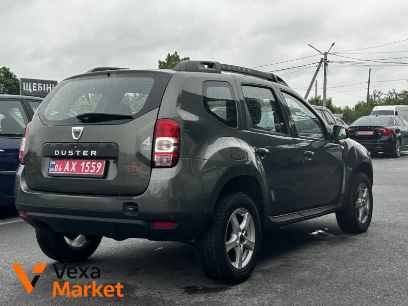 Dacia Duster 2014 Дизель 1.5 л. Зелений — фото 2