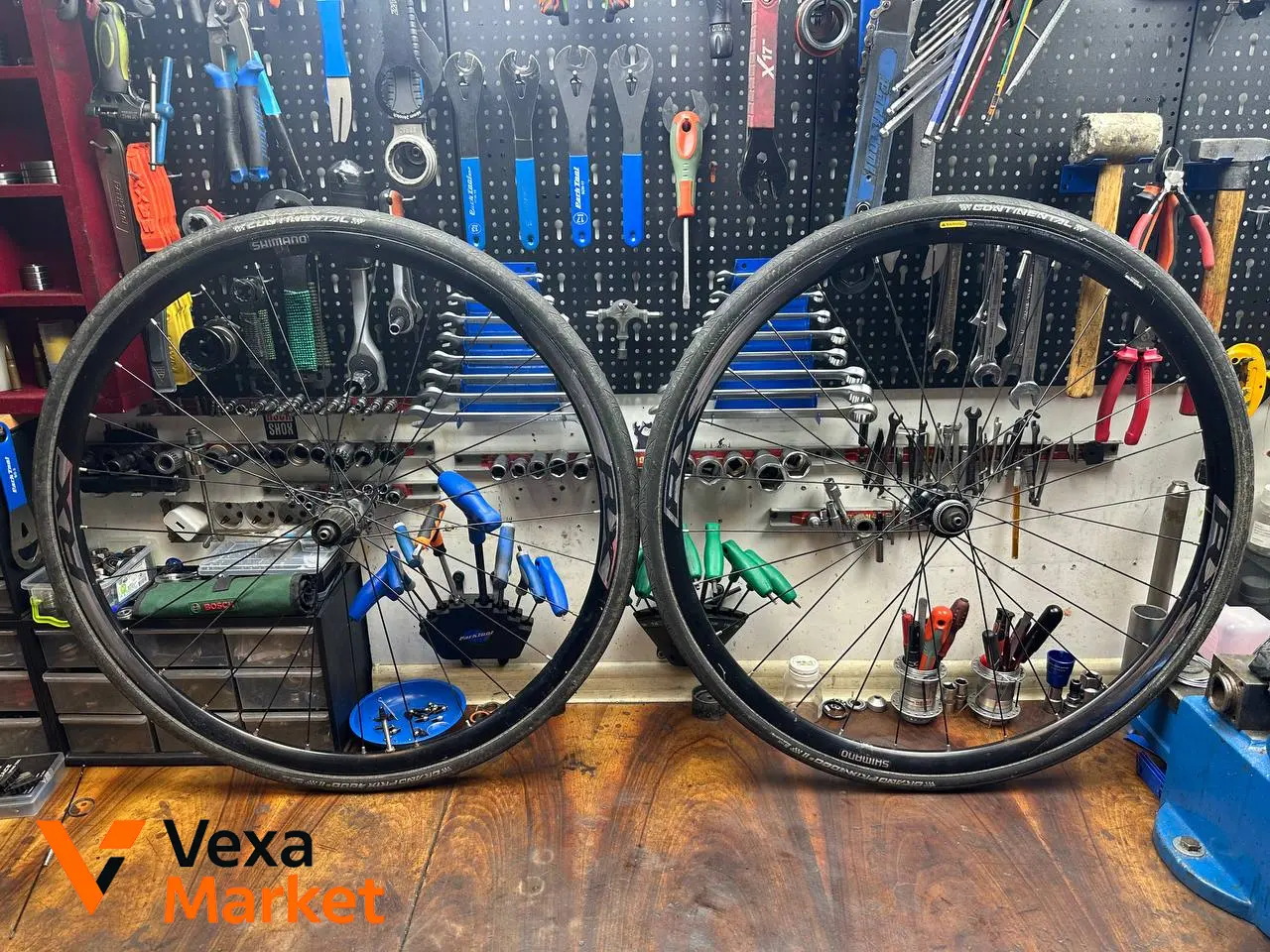 Колеса шосейні Shimano RX під дискові гальма, Centerlock, 28 спиць, з покришками Continental 700/25