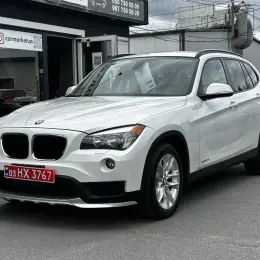 BMW X1 2014 Бензин 2.0л Автомат Полный привод Белый