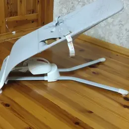 Шезлонг з колисковим центром