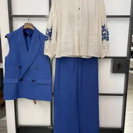 Жіночий одяг MaxMara: блуза, жилет та штани
