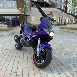 Скутер фиолетовый
