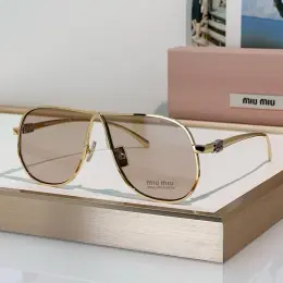 Окуляри Miu Miu золотисті