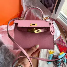 Hermes Kelly 20 розовая кожаная сумка