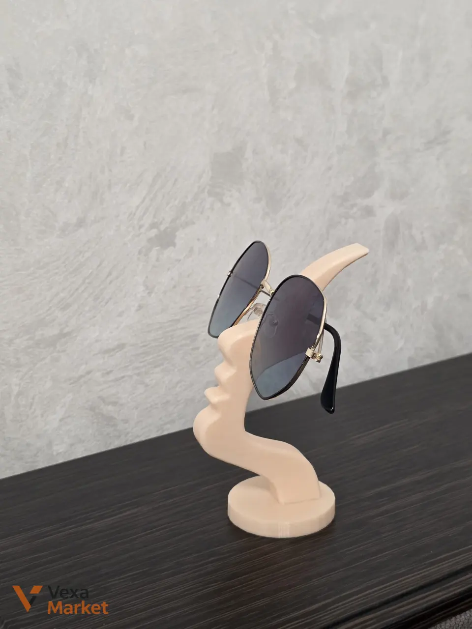 3D-печатная подставка для очков в форме абстрактного профиля лица — фото 2