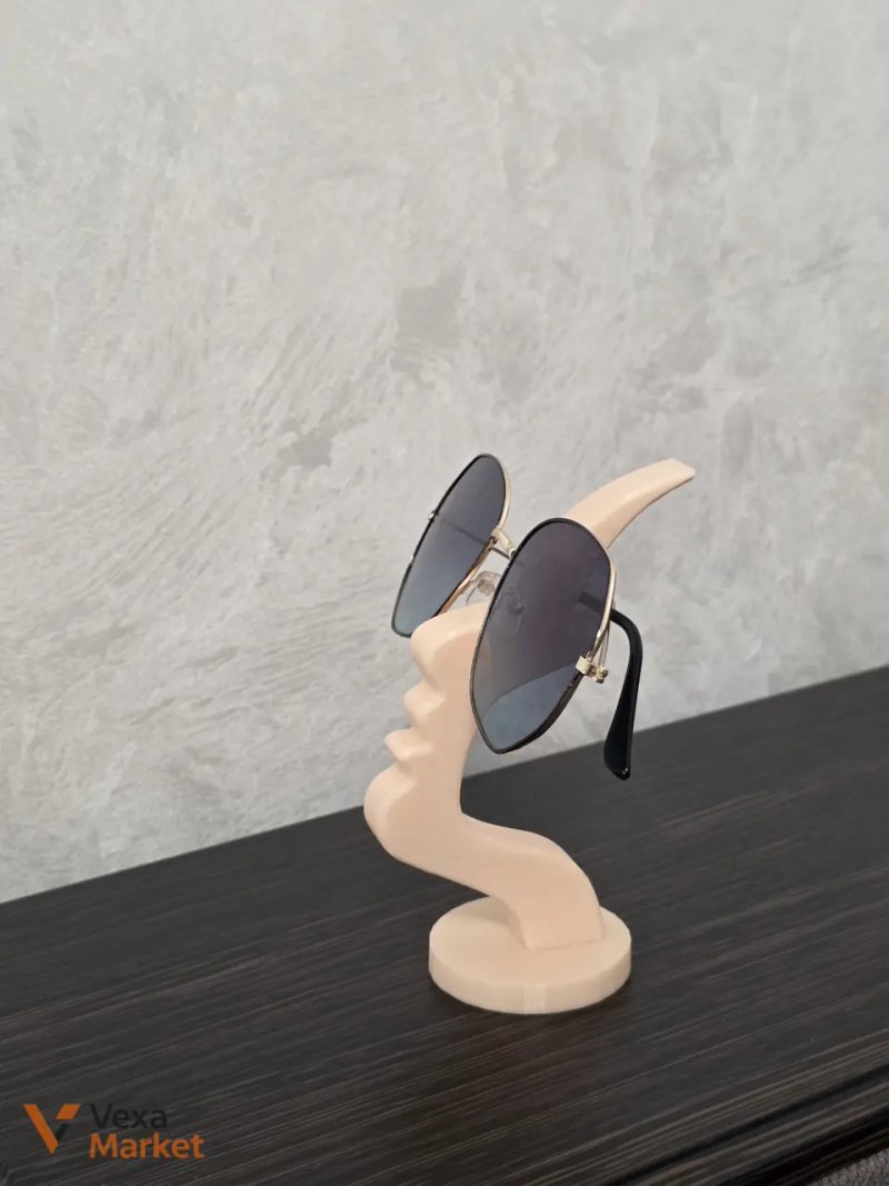 3D-печатная подставка для очков в форме абстрактного профиля лица — фото 2