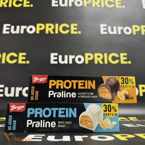 ΠΡΠΎΡΠ΅ΡΠ½ΠΎΠ²ΠΈΠΉ Π±Π°ΡΠΎΠ½ΡΠΈΠΊ Bergen Protein Praline Π· Π³ΠΎΡΡΡ
ΠΎΠ²ΠΎΡ Π½Π°ΡΠΈΠ½ΠΊΠΎΡ Π² ΡΠΎΠΊΠΎΠ»Π°Π΄Π½ΡΠΉ Π³Π»Π°Π·ΡΡΡ