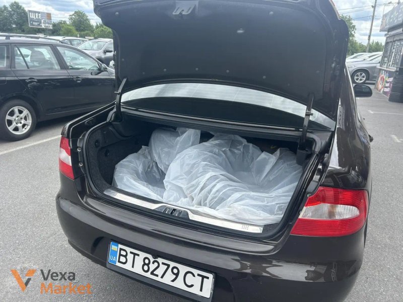 Skoda Superb II покоління 2012 Бензин 1.8 л. Коричневий — фото 5