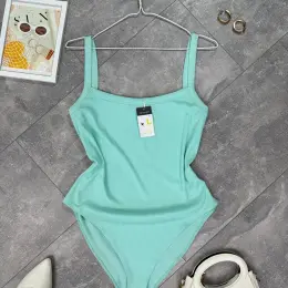 Базовий боді бірюзового кольору в рубчик від Primark