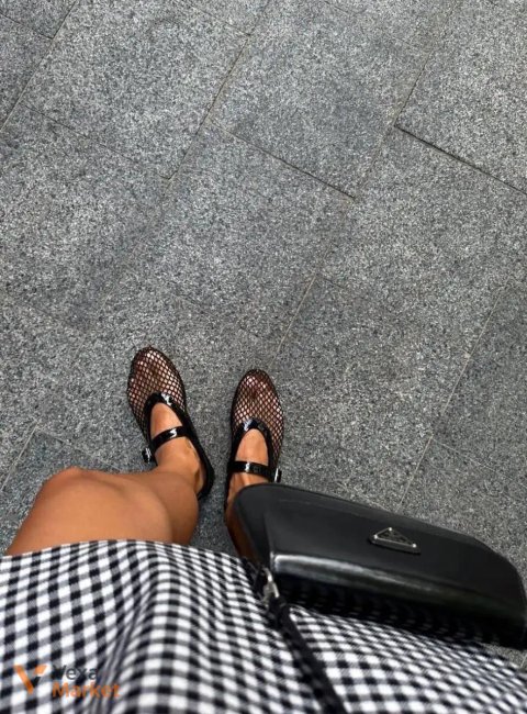 Alaia mules black
