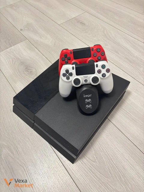 Ігрова приставка Sony PlayStation 4 з двома геймпадами та док-станцією