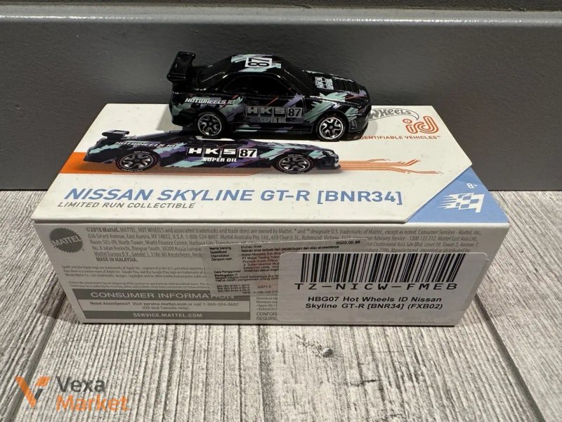 Колекційні моделі Hot Wheels ID Bugatti Chiron, Nissan Skyline GT-R (R33) HKS, Tesla Model S — фото 4