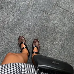 Alaia mules black