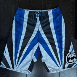 Vintage Billabong Samurai Andy Irons board shorts, size 32