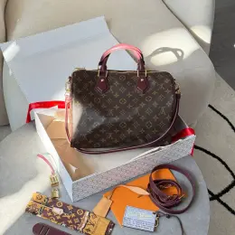 Сумка Louis Vuitton Speedy Soft 30 шкіра/канва