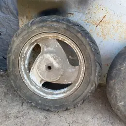 Диски з гумою для скутера