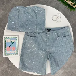 Блакитний джинсовий костюм (корсет + шорти) від Boohoo в паєтках