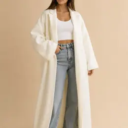 Стильне молочне пальто oversize