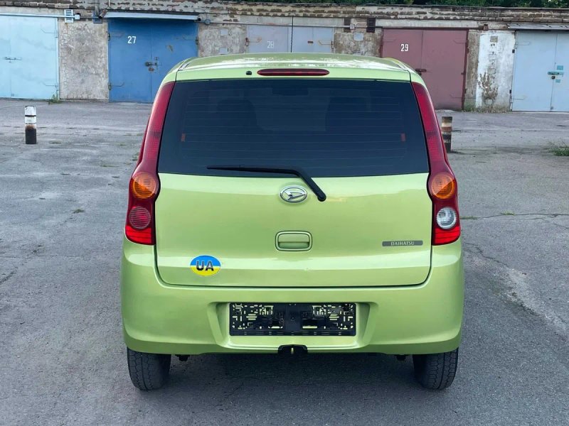 Daihatsu Cuore 2010 автомат — фото 5