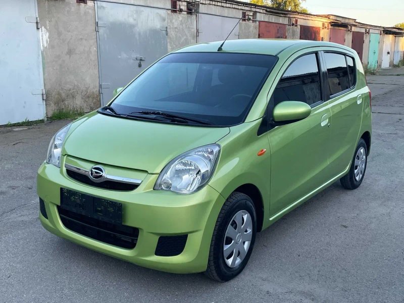 Daihatsu Cuore 2010 автомат — фото 8