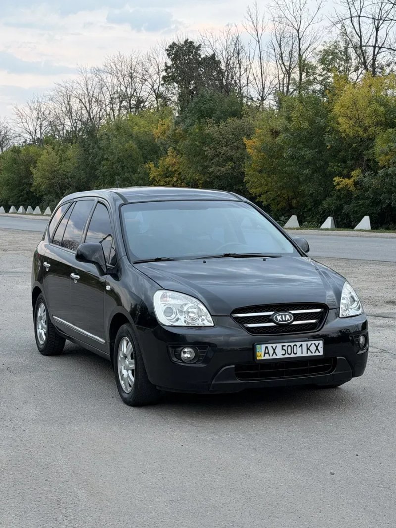 Kia Carens 2009 - 2.0 бензин — фото 2