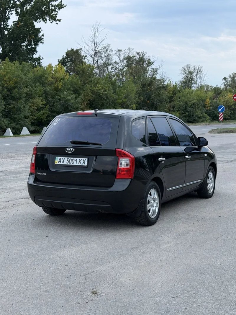 Kia Carens 2009 - 2.0 бензин — фото 4