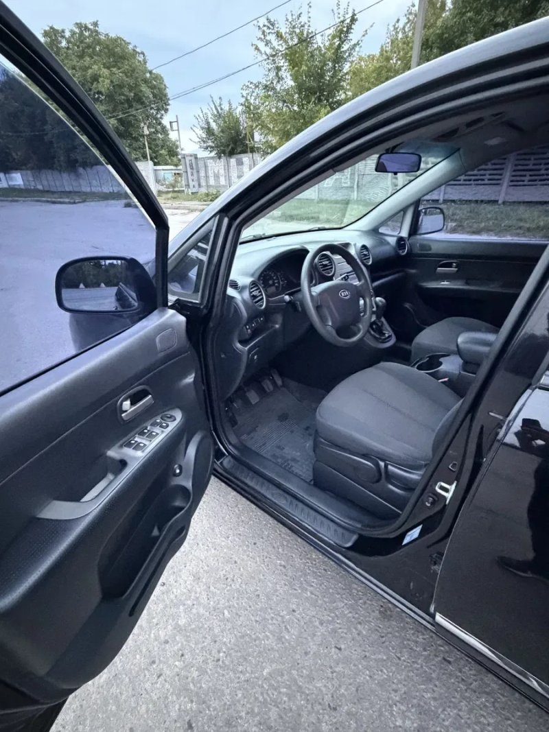 Kia Carens 2009 - 2.0 бензин — фото 5