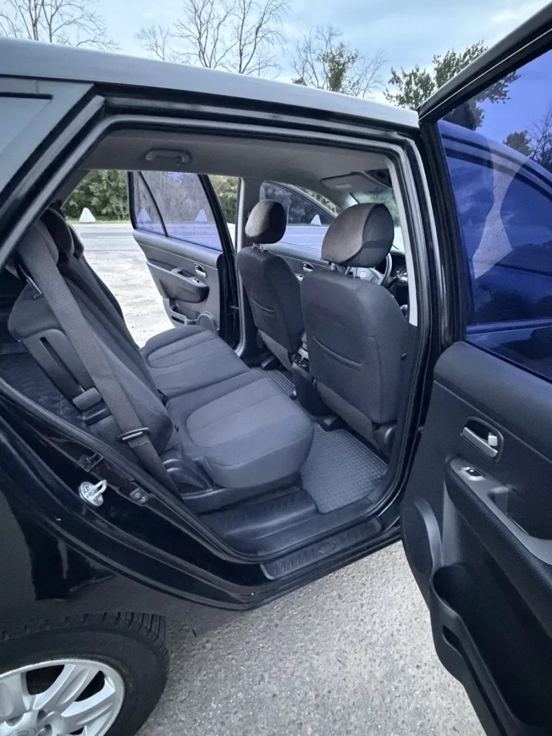 Kia Carens 2009 - 2.0 бензин — фото 6