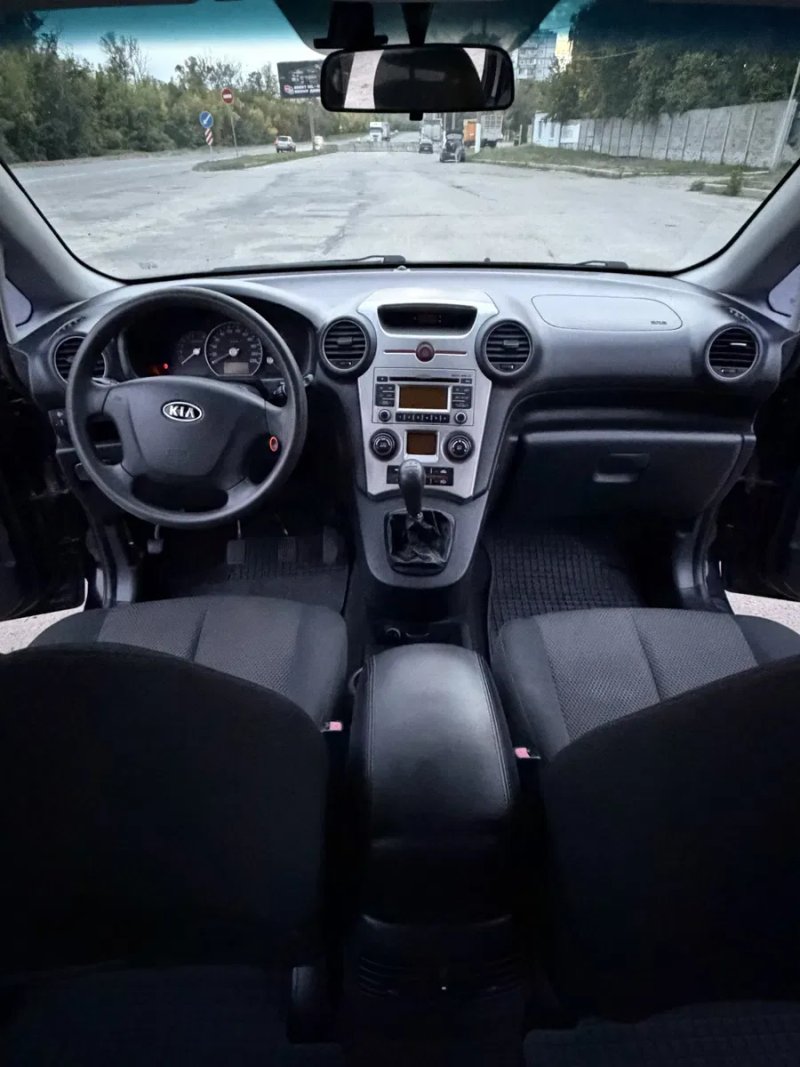Kia Carens 2009 - 2.0 бензин — фото 7
