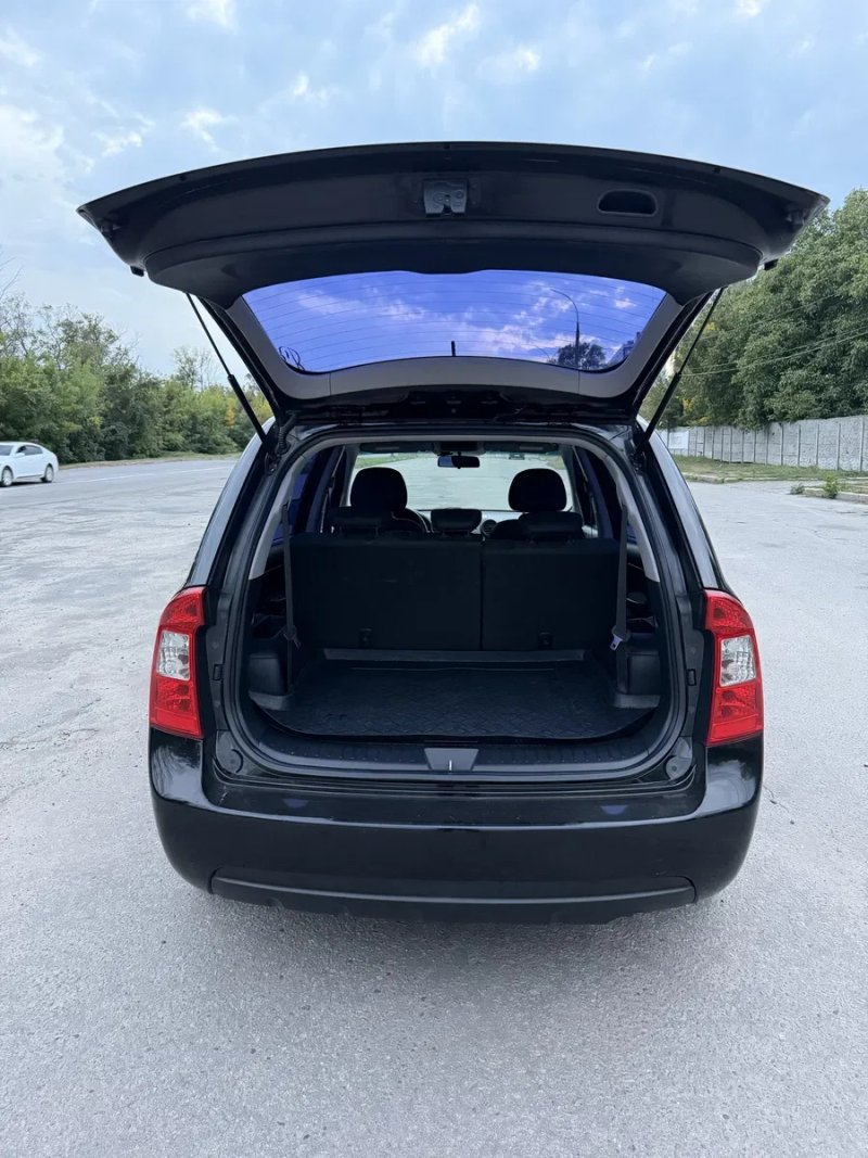 Kia Carens 2009 - 2.0 бензин — фото 8
