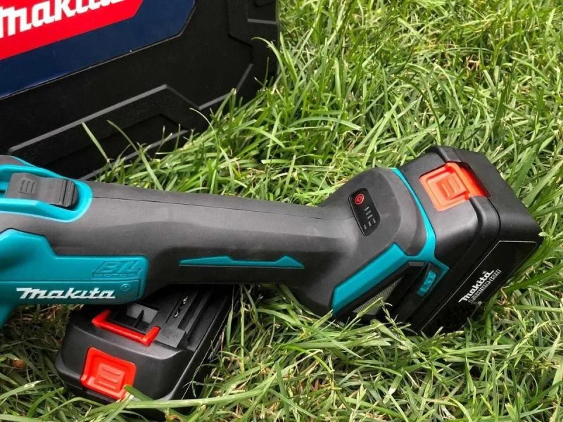 Набор аккумуляторного инструмента. Болгарка + цепная пила 12". Makita — фото 2