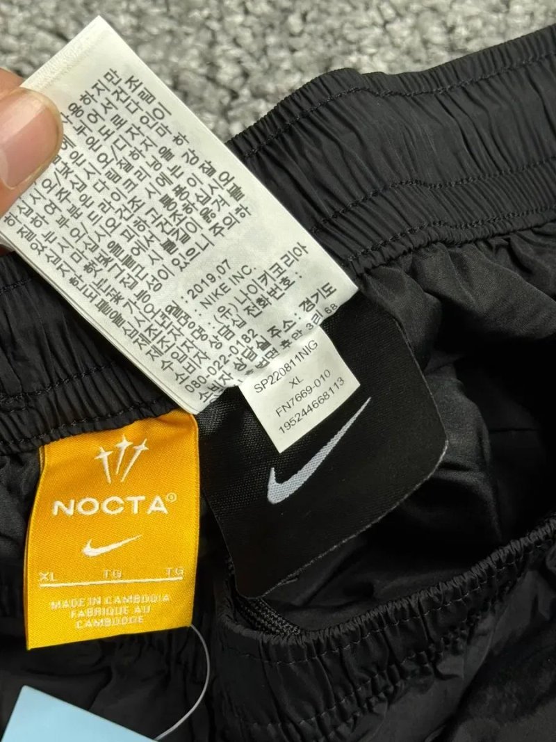 Нейлонові штани Nike Nocta — фото 4