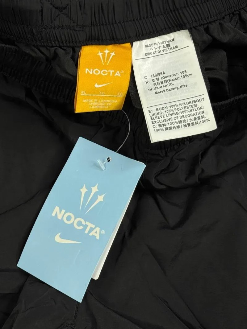 Нейлонові штани Nike Nocta — фото 5