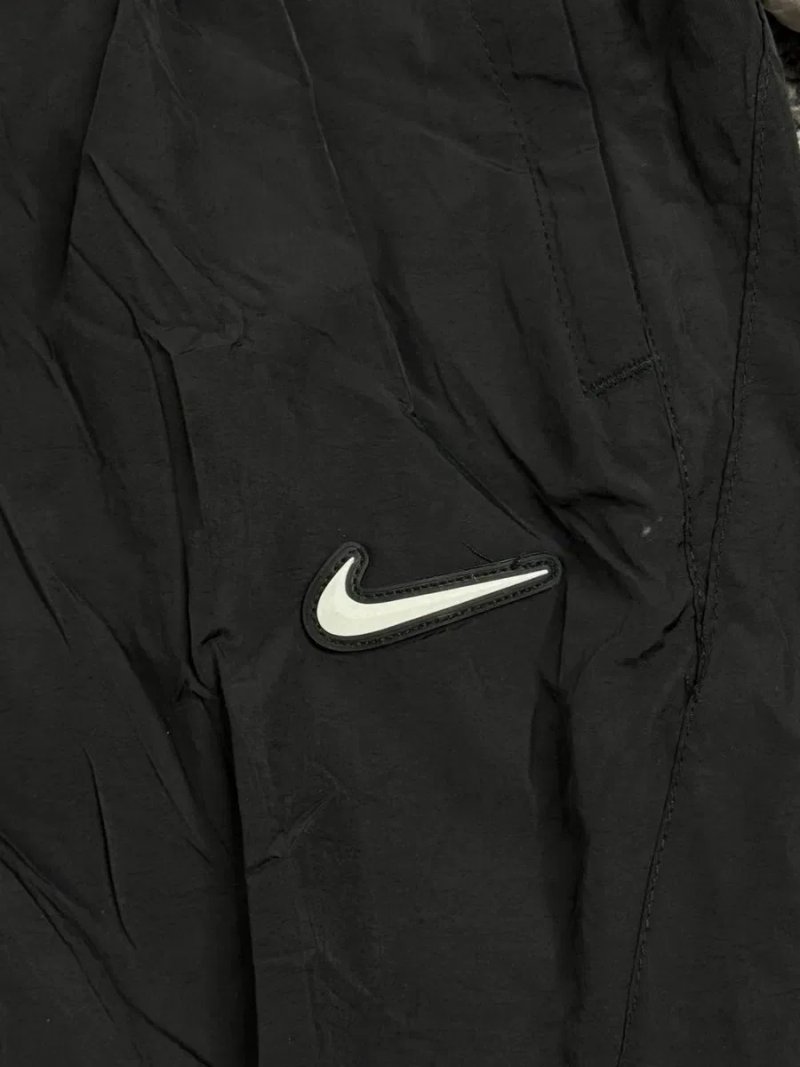 Нейлонові штани Nike Nocta — фото 7