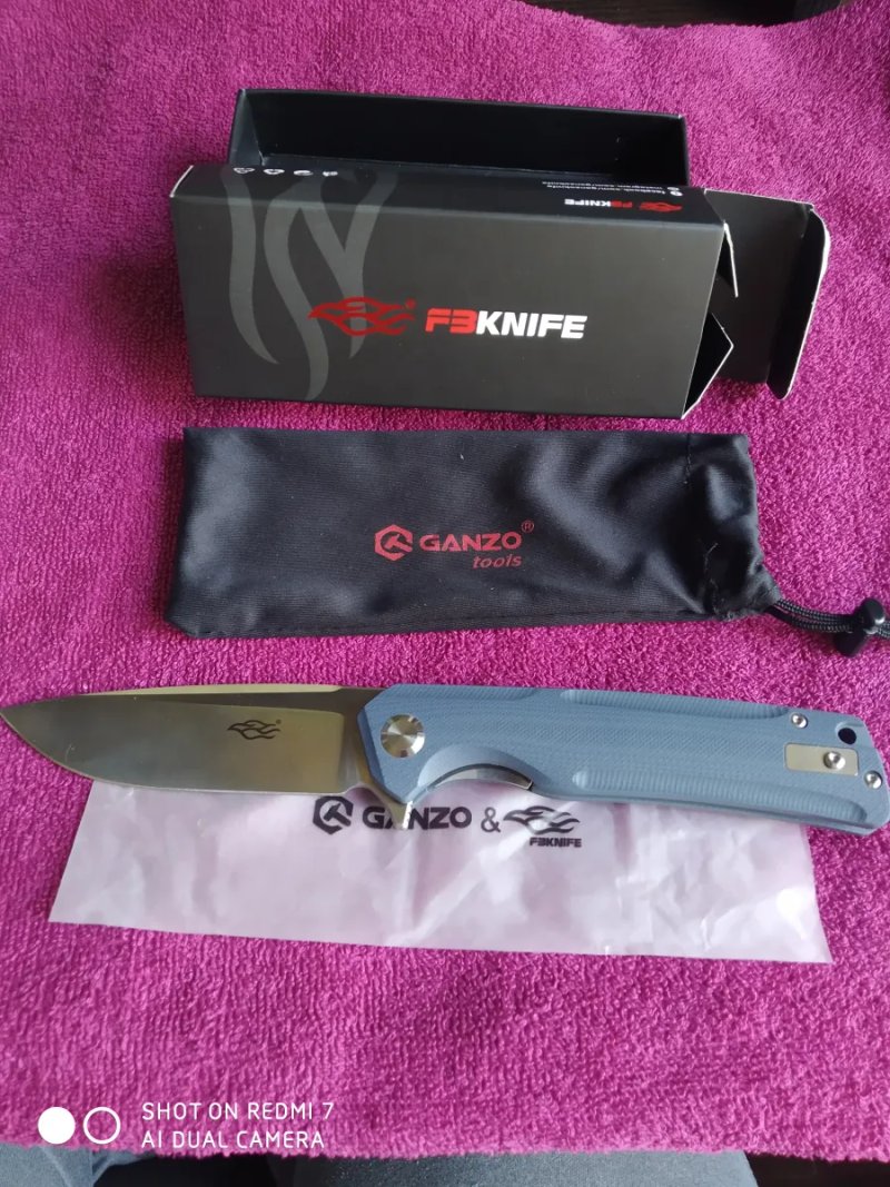 Ніж туристичний складний Ganzo Firebird FH91 (8.8 см) D2 / G10 сірий — фото 2