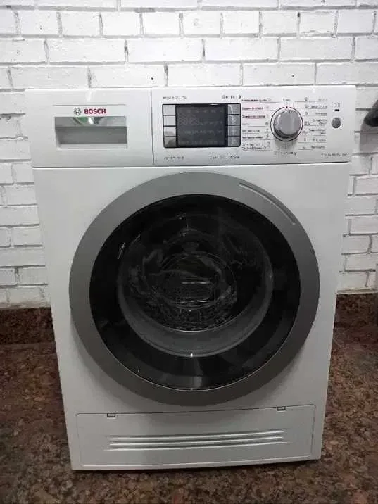 Премиум стиральная + сушильная машина Bosch WDU28590OE состояние новой — фото 4