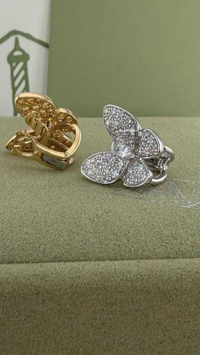 Сережки золоті 750 проба — фото 3