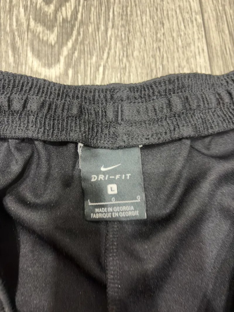 Спортивні штани Nike Dri-Fit , у чорному кольорі , в розмірі М-L — фото 3