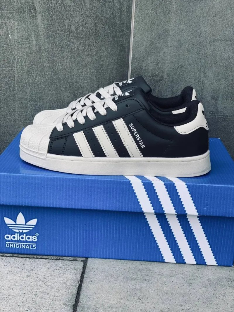 Суперстари жіночі • кроосовки адідас суперстар • adidas superstar • шкіряні кросівки адідас • адіки чорно білі — фото 6