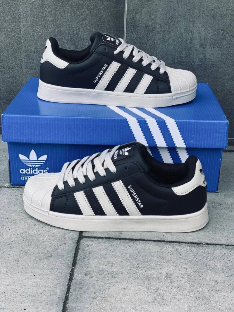 Суперстари жіночі • кроосовки адідас суперстар • adidas superstar • шкіряні кросівки адідас • адіки чорно білі — фото 7