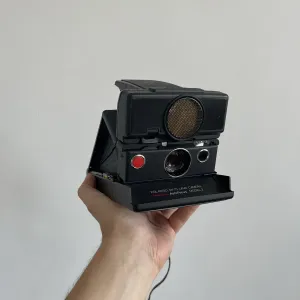 Легенда Polaroid SX-70 Сонар Автофокус